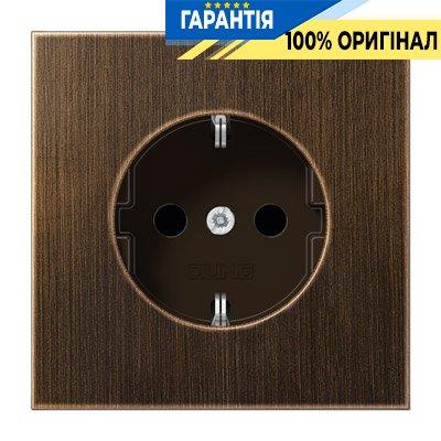 Розетка із заземленням і захистом Jung ME1520KIAT латунь Antik
