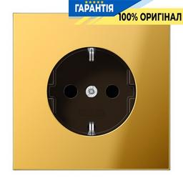 Розетка із заземленням і захистом Jung GO1520KI імітація золота